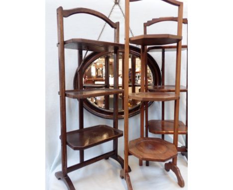 THREE OAK FOLDING CAKE STANDS and a wall mirror