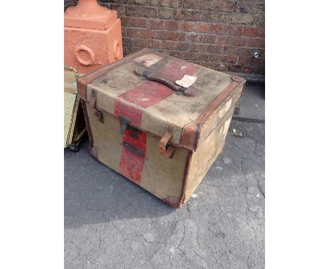 A VICTORIAN CANVAS AND LEATHER TRIMMED TRUNK 