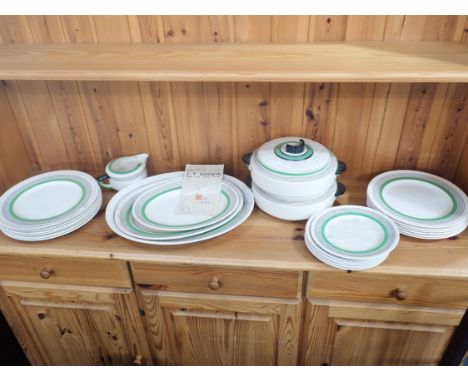 A ROYAL DOULTON 'RADIANCE' ART DECO DINNER SERVICE purchased in 1937 from Godwin Stores, Dorchester and Weymouth