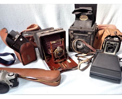 A  BAUSCH &amp; LOMB 'UNICUM' PECTO N0. 5 BELLOWS CAMERA (in need of restoration), another vintage box camera, and other phot