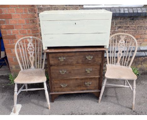 AN EDWARDIAN BEECH CHEST OF DRAWERS a painted trunk, and two limed Windsor chairs