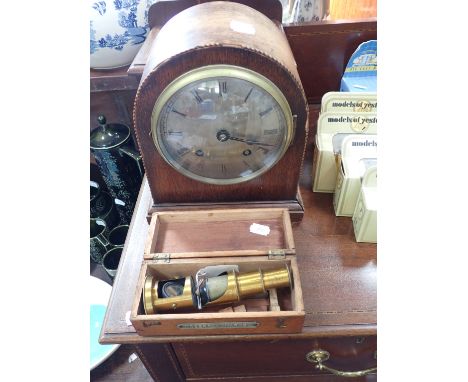 A 1920S OAK CASED MANTEL CLOCK and a student's microscope (2)