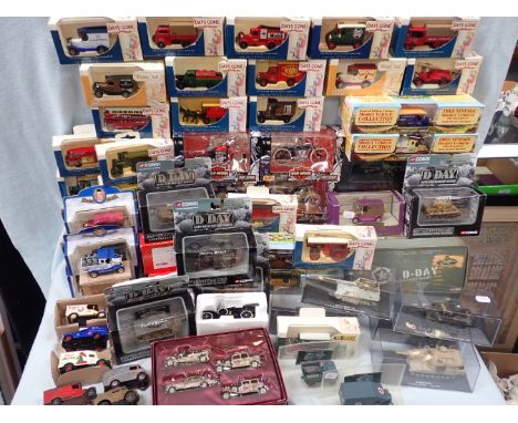 A COLLECTION OF 'MAISTO' HARLEY-DAVIDSON MODELS  and other boxed model vehicles, including military