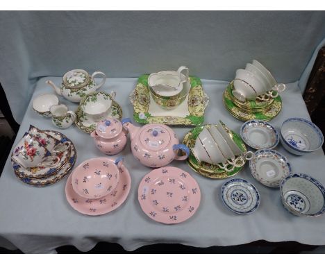 A COLLECTION OF TEA WARE and modern Chinese bowls with 3 saucers