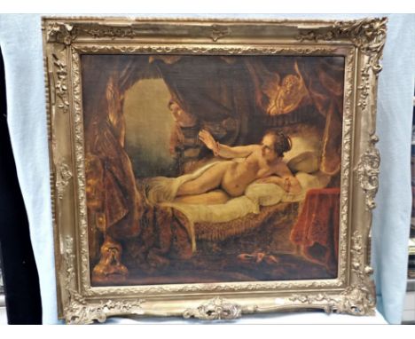 AN OLEOGRAPH AFTER REMBRANDT in a gilt frame (damage to frame)