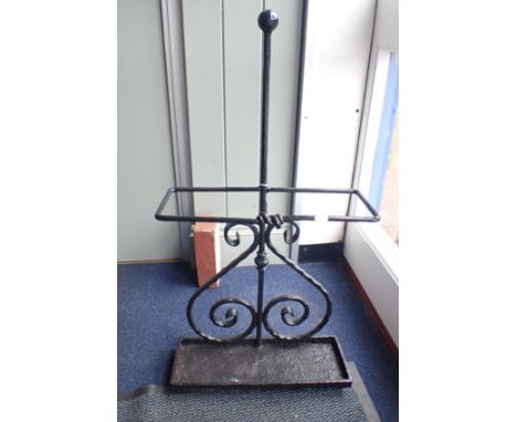 A WROUGHT IRON STICK STAND 