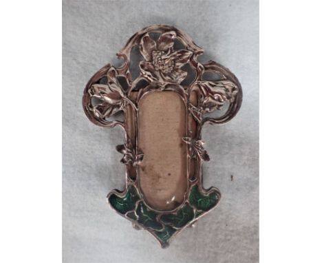 A MINIATURE ART NOUVEAU STYLE WHITE METAL PHOTOGRAPH FRAME with enamelling 9 cm high (no backstand)