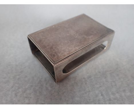 A TIFFANY &amp; CO STERLING SILVER MATCHBOX HOLDER with planished surface 6 cm long