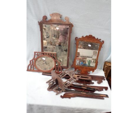 A GEORGE III MIRROR and similar in need of restoration