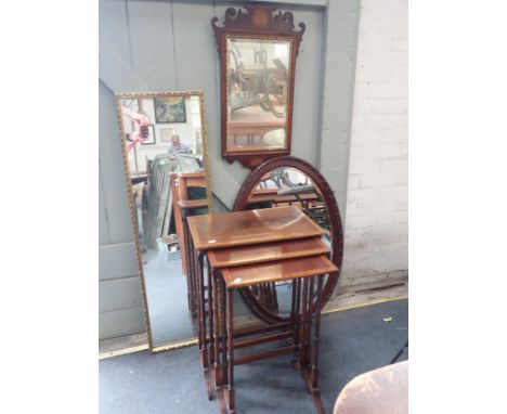 A GEORGE II STYLE WALL MIRROR two other mirrors, and a nest of three tables