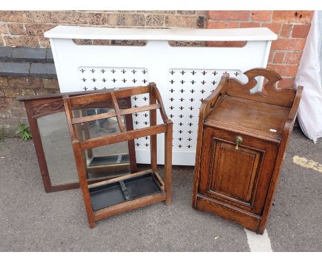 AN OAK PURDONIUM a painted radiator cover, an oak stick stand and a mirror (4) 