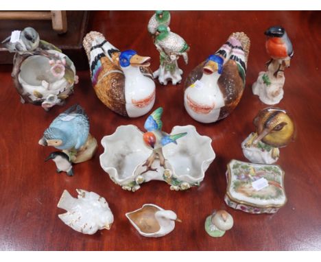A PAIR OF CONTINENTAL COVERED DISHES MODELLED AS DUCKS (one with broken lid) further ceramic bird s and other items (damage t