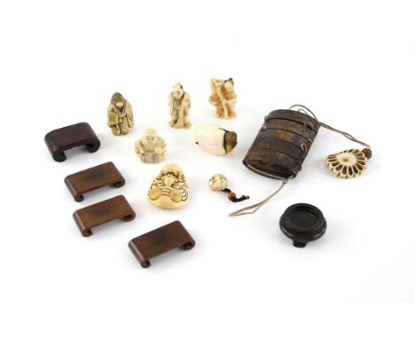 A Group of seven netsuke and an Inro including a four-case Ray  skin Inro with an Ojime and a Ryusa-netsuke 8,7cm long togeth
