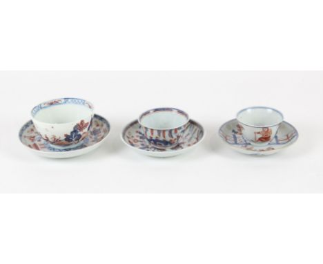 A Group of Chinese Imari saucers and cups 18th century (6). One rare dish and tea cup painted with figure of a foreigner sitt