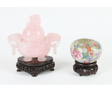 A Chinese rose quartz censer and cover and a millefleur brush washer the censer with lion finial and lion-head handles on thr