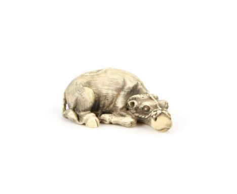 A Japanese Netsuke , Meiji Period, Circa 1890 Carved Ivory representing an Ox, Signed . 1.9 X 4..9 cm, Comes with a Dutch cer