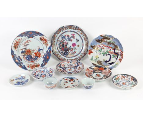 A collection of Chinese and Japanese Imari Porcelain , 18th and 19th Century (11). Included 9 dishes and saucers and two tea 