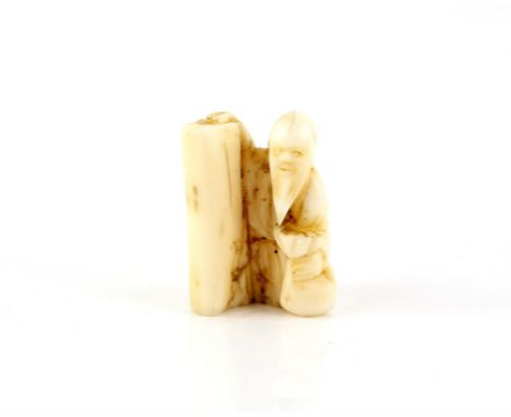 A Japanese Netsuke , Meiji Period Carved Ivory in shape of man with bag , 3.7 X 2.6 cm, Comes with a Dutch certificate of aut