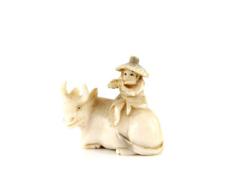 A Japanese Netsuke , Meiji Period Carved Ivory representing a man playing flute on an ox . 7.4 X 2 cm, Comes with a Dutch cer