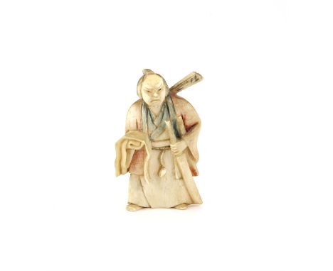 A Japanese Netsuke , Meiji Period, Carved Ivory representing a man holding a sword,. Signed  . 6.5 X 3.9 cm, Comes with a Dut