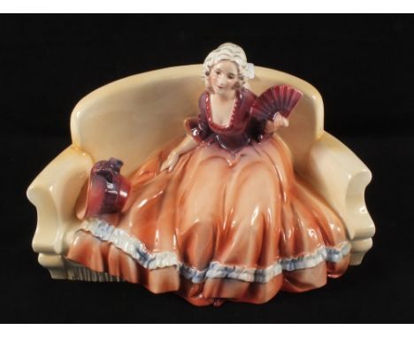 A Katzhutte porcelain seated lady on a sofa