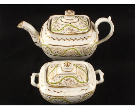 A 19th Century English porcelain teapot and sucrier with green gilt decoration (base crack to teapot)