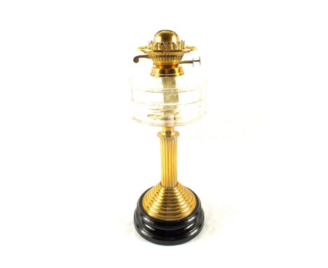 A Brass column oil lamp