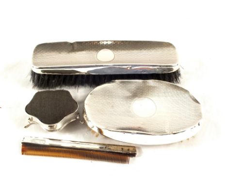 A Silver pin cushion, two brushes and a comb