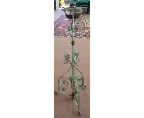 An Iron and Copper bowl adjustable oil floor lamp