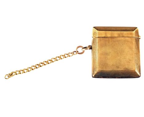 A 9ct Gold engine turned vesta with a small length of 18ct Gold chain 