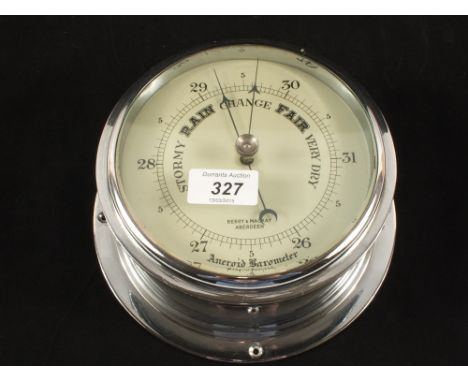 A circular chromium ship's aneroid barometer by Berry & Mackay, Aberdeen