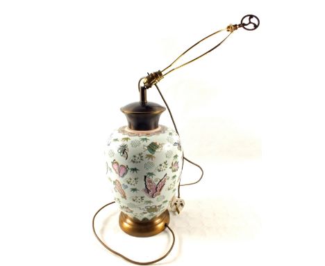 A Chinese porcelain butterfly and floral table lamp