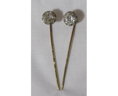 Pair of yellow metal stick pins with flower head paste stones