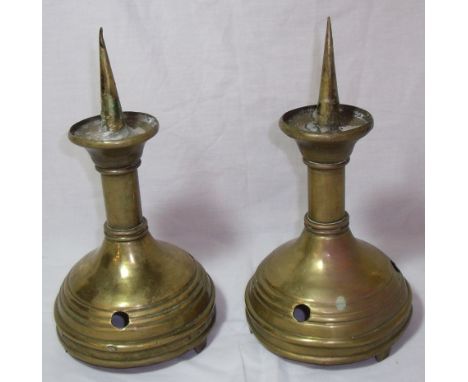 Pair of copper church alter style candle stick holders with prominent mounting spikes on turned column and circular bases (he