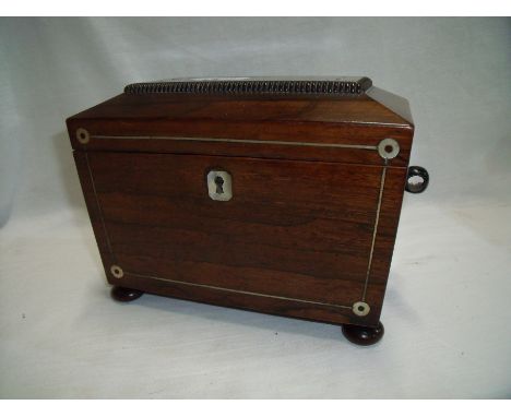 19th Century rose wood tea caddy with hinged top and two section interior, turned ivory handles and mother of pearl inlaid de