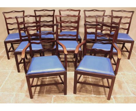A set of ten Chippendale style mahogany ladder back dining chairs, early 20th century, each with three pierced rungs over a d
