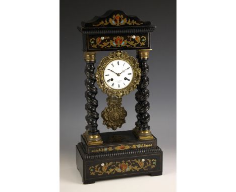 A French ebonised eight day portico clock, signed 'F.L Hasuberg, Paris', mid to late 19th century, of typical architectural f