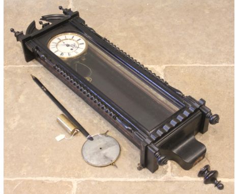 An eight day ebonised Vienna wall timepiece, late 19th/early 20th century, the architectural case with bobbin turned pillars 