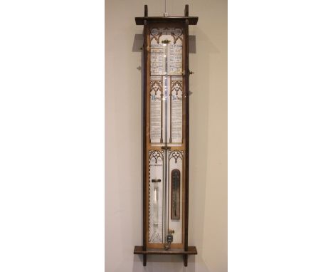 A reproduction oak cased Admiral Fitzroy wall barometer, 20th century, the architectural case enclosing the paper register, b