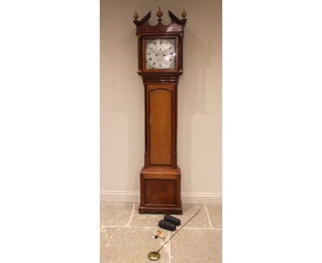 A late George III honey oak and mahogany crossbanded longcase clock signed William Evans, Shrewsbury, the architectural hood 