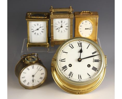 A German brass cased bulk head clock, by Schatz, 13cm dial, with a two train movement, a brass cased drum clock with a 9cm di