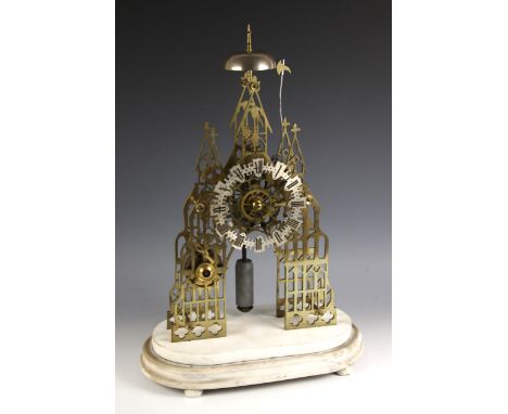 A Victorian brass eight day fusee skeleton clock, of Gothic architectural form, with overhead saucer bell above the 16cm silv