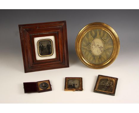 A selection of five Victorian photographic portraits, 19th century, to include a portrait of a child, a portrait of a seated 