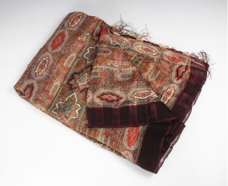 A fine silk gauze Victorian polychrome printed Paisley shawl, circa 1850, cut and re-joined, approximately 280cm long x 175cm