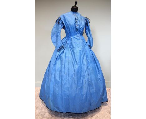 A Victorian sapphire blue and black finely striped silk dress, circa 1860, the shoulders, head of sleeve and cuffs with jet c