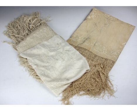 A Chinese cream ground silk embroidered shawl, approx 150cm excluding fringe (some discoloration), with a further smaller exa