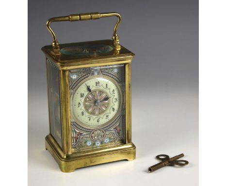 A brass cased two train repeating carriage clock, late 19th century, the 7cm enamel dial with engine turned foliate decoratio