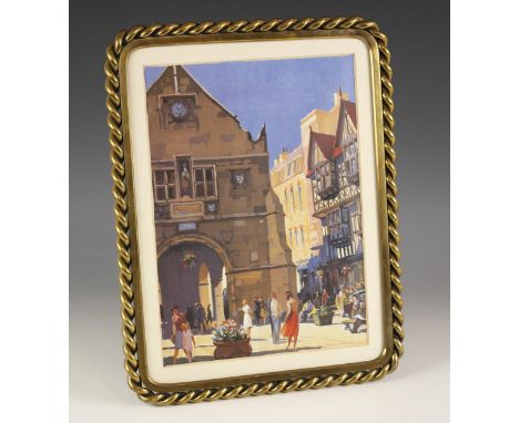 A Victorian style brass picture frame of large proportions, late 19th or early 20th century, of rectangular form with with cu