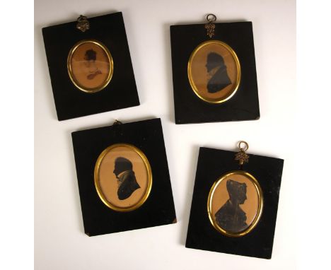 English school (early 19th century),An oval bust length portrait miniature depicting a lady facing dexter wearing a ruby neck