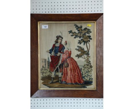 A 19th century gros point tapestry panel of two 18th century figures, 16" x 13", in oak frame 